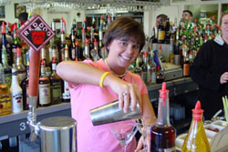 Actual students practicing behind the bar at the Maryland Bartending Academy!