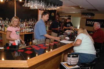 Learn behind an actual bar from our qualified instructors at the Midwest Bartending School.