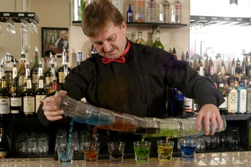 Learn bartending flair behind an actual bar from our professional instructors at the Phoenix - Tempe, Arizona Bartending Academy!